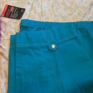 Blue capris with button on leg